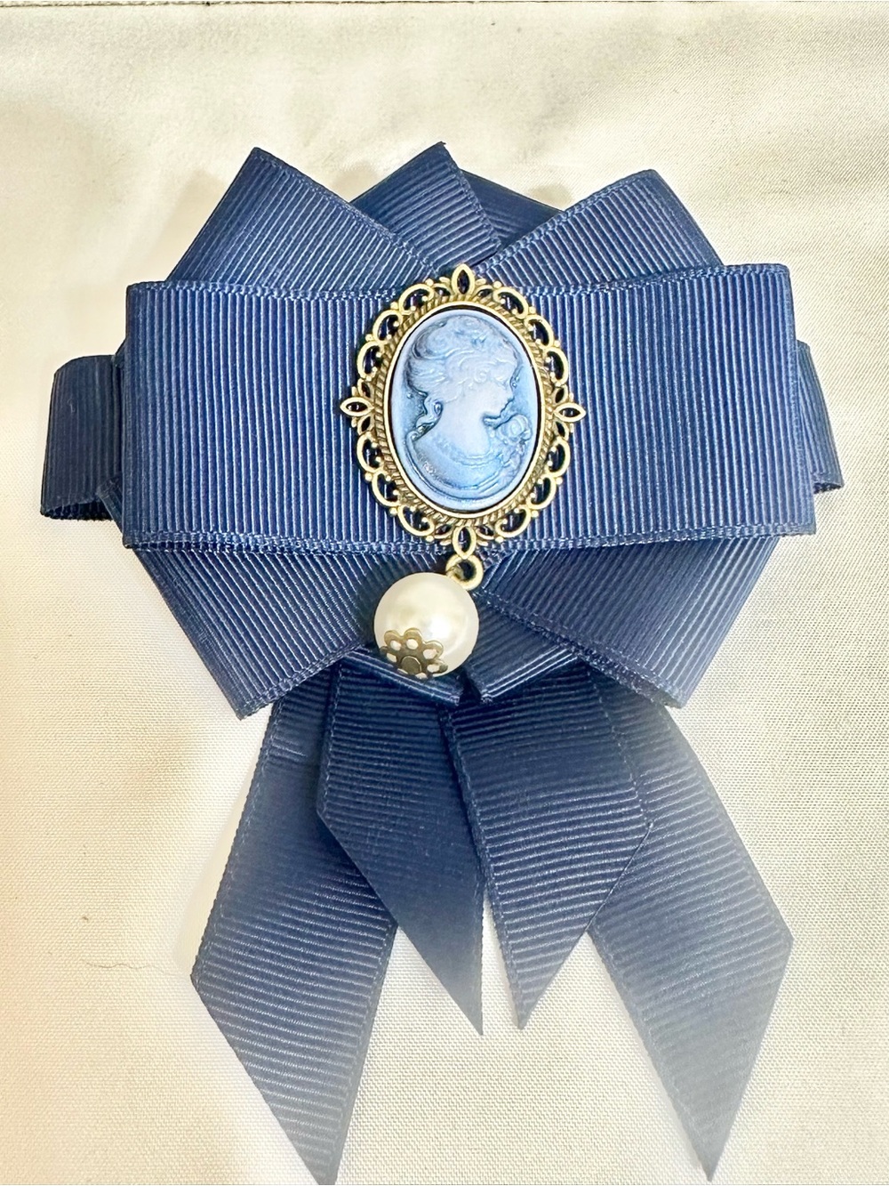 Vintage-Inspired Navy Blue Cameo Ribbon Brooch